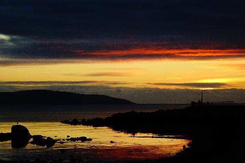 Reflections from a colourful sky on the Atlantic ocean