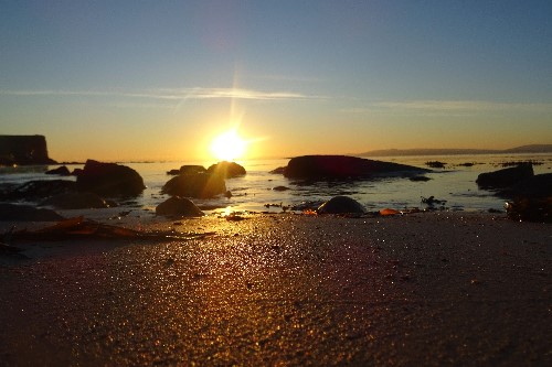 A sunrise allowing the sand to sparkle in Salthill setting the atmosphere for a new day, a new life